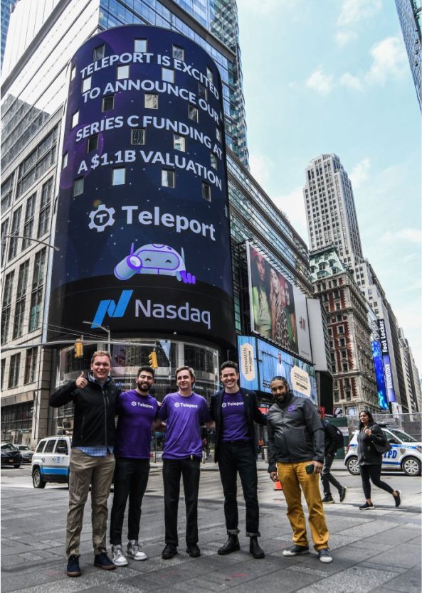 Teleport team in Times Square under the Nasdaq Series C announcement